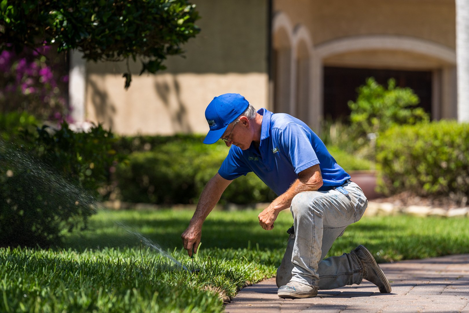 irrigation technician calibrating a sprinkler head 2