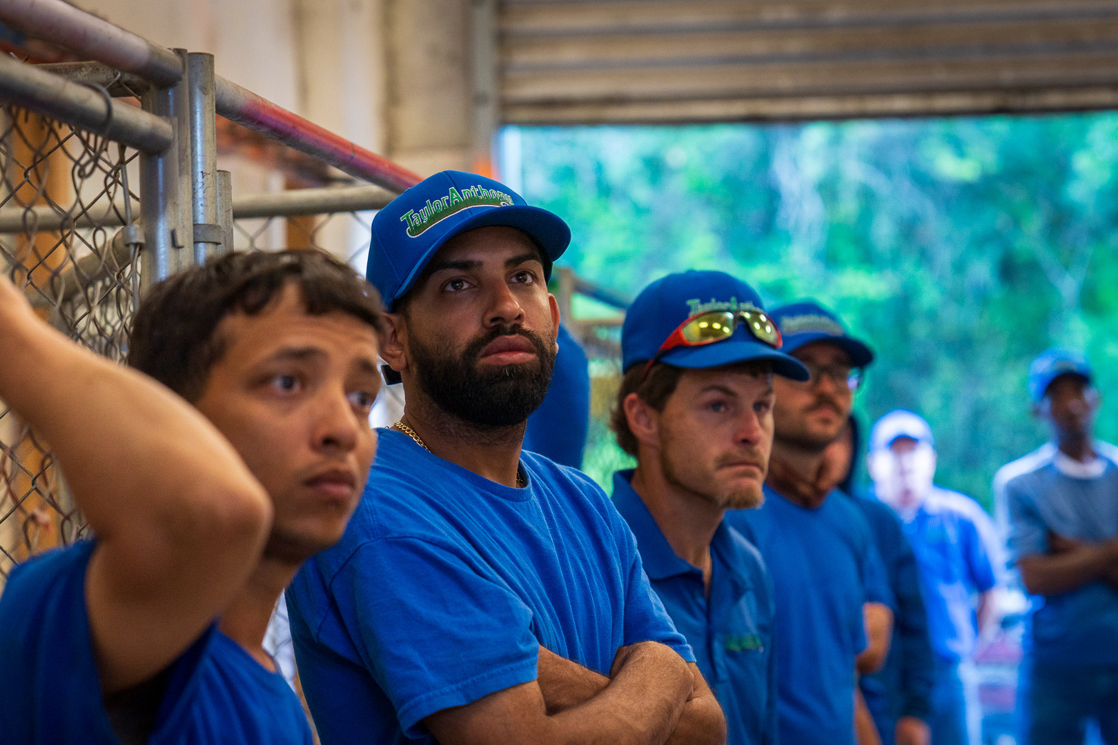 team members reviewing schedule at morning meeting 4